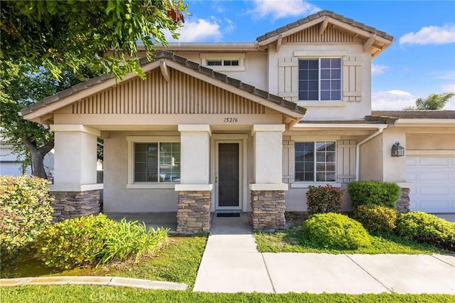 15216 Masline St, Baldwin Park, CA 91706 - craftsman-style house featuring stucco siding, stone siding, and a garage
