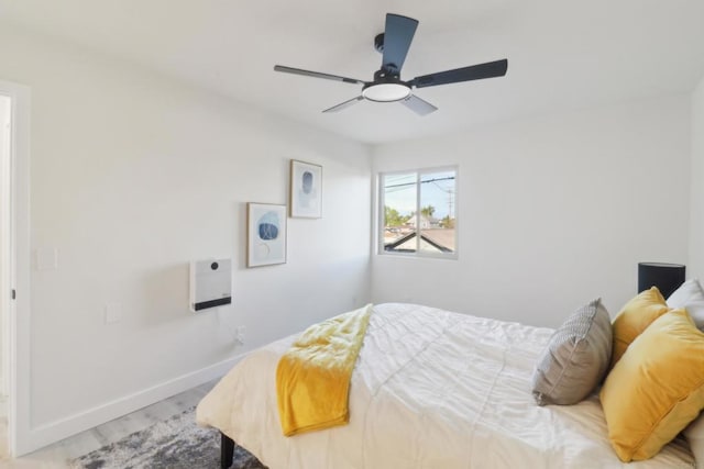 3535 Monroe Ave Unit 5, San Diego, CA 92116 - bedroom featuring wood finished floors and a ceiling fan