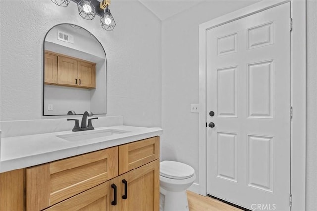 37727 Dixie Dr, Palmdale, CA 93550 - bathroom with vanity and wood finished floors