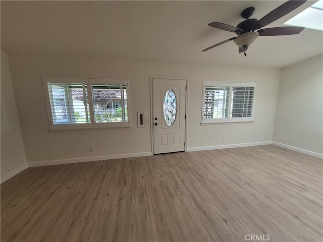 1501 Pelham Rd Unit 127J, Seal Beach, CA 90740 - entryway featuring plenty of natural light, light wood finished floors, and a ceiling fan