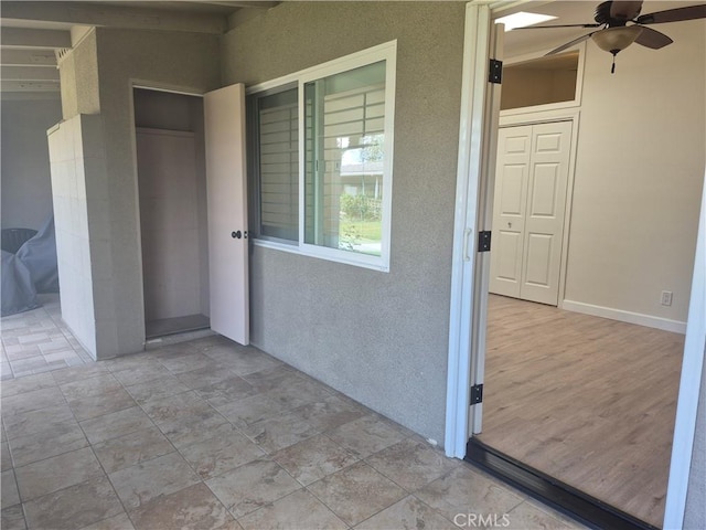 1501 Pelham Rd Unit 127J, Seal Beach, CA 90740 - entrance to property with stucco siding and ceiling fan