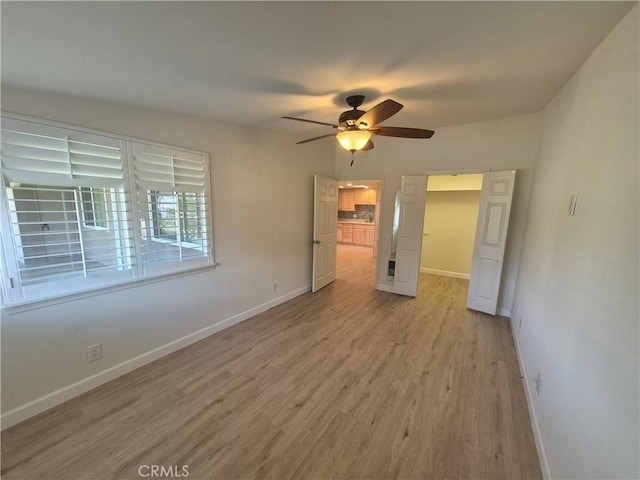 1501 Pelham Rd Unit 127J, Seal Beach, CA 90740 - unfurnished bedroom featuring light wood-type flooring and a ceiling fan