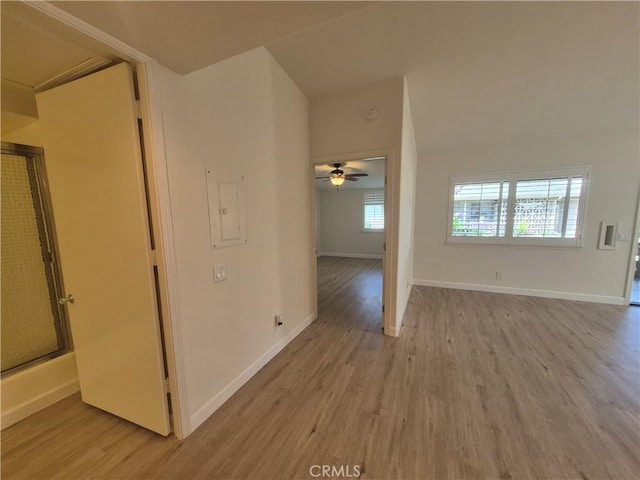 1501 Pelham Rd Unit 127J, Seal Beach, CA 90740 - spare room with light wood-type flooring, a ceiling fan, and electric panel