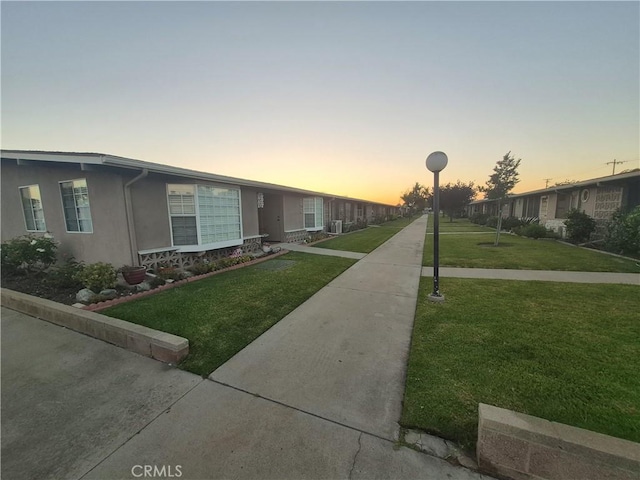 1501 Pelham Rd Unit 127J, Seal Beach, CA 90740 - single story home featuring a yard and stucco siding