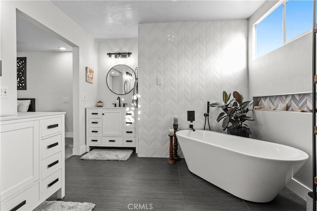 25891 Pinewood Ln, Laguna Hills, CA 92653 - bathroom featuring vanity and a freestanding bath