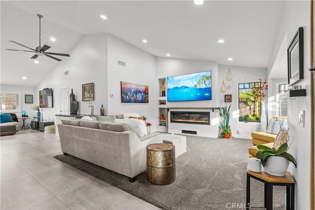 25891 Pinewood Ln, Laguna Hills, CA 92653 - living room featuring recessed lighting, a glass covered fireplace, high vaulted ceiling, plenty of natural light, and a ceiling fan