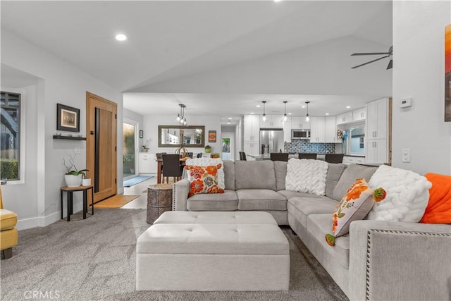25891 Pinewood Ln, Laguna Hills, CA 92653 - living area featuring lofted ceiling, recessed lighting, a ceiling fan, and carpet floors