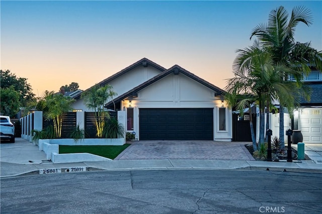 25891 Pinewood Ln, Laguna Hills, CA 92653 - view of front of house with a garage and driveway