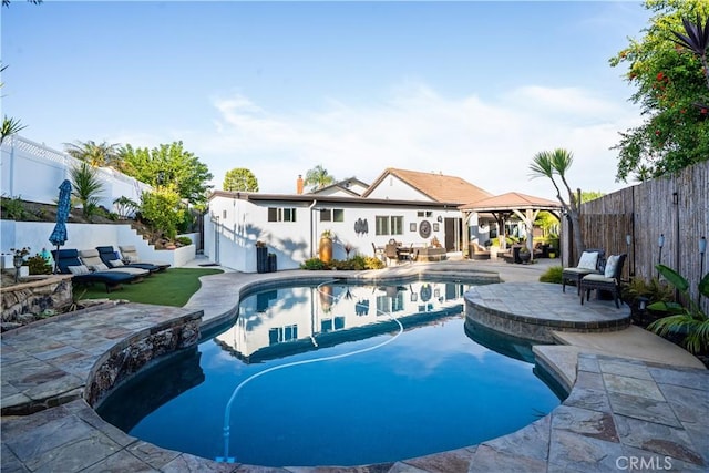 25891 Pinewood Ln, Laguna Hills, CA 92653 - view of pool featuring a gazebo, a patio area, a fenced backyard, and an outdoor hangout area