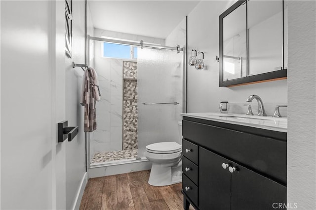 25891 Pinewood Ln, Laguna Hills, CA 92653 - full bath with vanity, a stall shower, and wood finished floors
