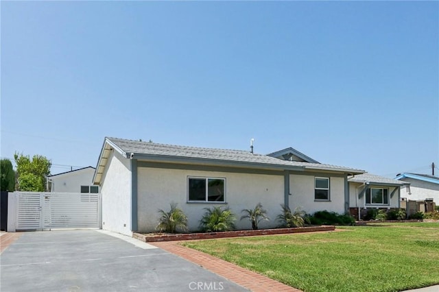 17148 Stare St, Northridge, CA 91325 - view of front of property with stucco siding and a gate