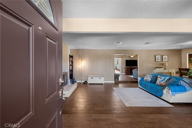 44112 Precise St, Lancaster, CA 93536 - living area featuring wood finished floors, a textured ceiling, and ceiling fan