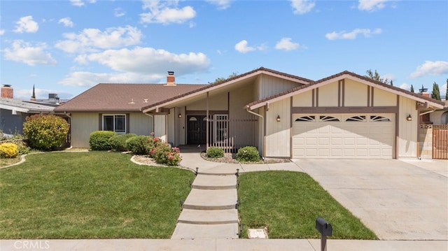 44112 Precise St, Lancaster, CA 93536 - view of front of house featuring an attached garage, concrete driveway, a front lawn, and a chimney