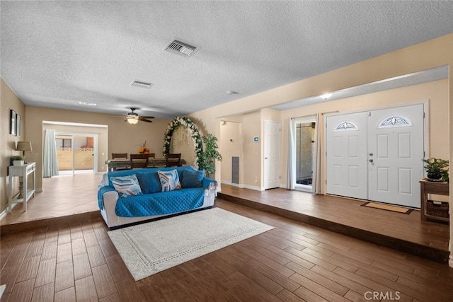 44112 Precise St, Lancaster, CA 93536 - living area with a ceiling fan, wood finished floors, and a textured ceiling