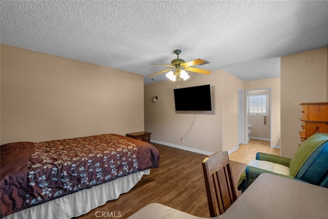 44112 Precise St, Lancaster, CA 93536 - bedroom featuring a textured ceiling, wood finished floors, and ceiling fan