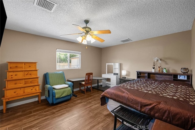 44112 Precise St, Lancaster, CA 93536 - bedroom with wood finished floors, a textured ceiling, and ceiling fan