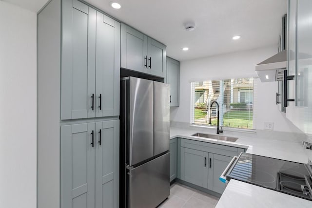 4540 Maple Ave Unit 153, La Mesa, CA 91941 - kitchen featuring freestanding refrigerator, range with electric cooktop, recessed lighting, light countertops, and light tile patterned floors