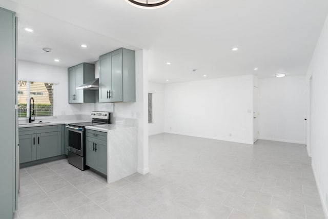 4540 Maple Ave Unit 153, La Mesa, CA 91941 - kitchen with electric range, open floor plan, light countertops, recessed lighting, and gray cabinets