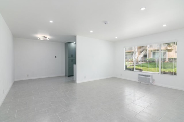 4540 Maple Ave Unit 153, La Mesa, CA 91941 - empty room featuring recessed lighting, a wall mounted air conditioner, and light tile patterned flooring