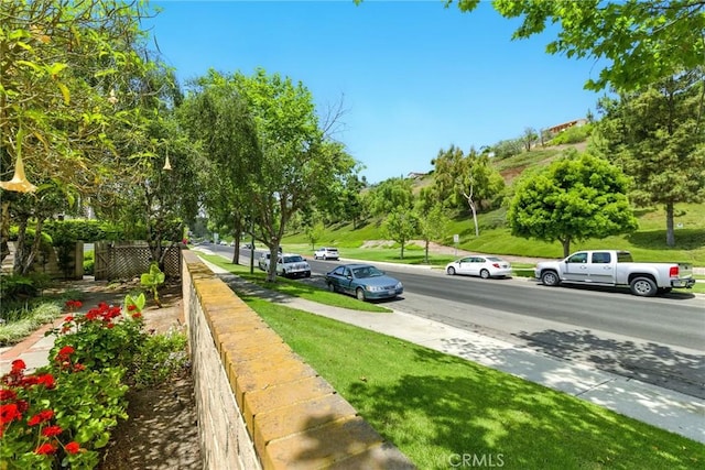 24571 Camden Ct, Laguna Niguel, CA 92677 - view of asphalt road with sidewalks