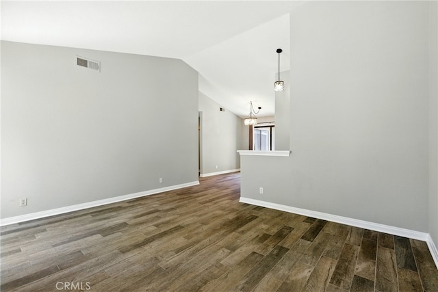 24571 Camden Ct, Laguna Niguel, CA 92677 - empty room with dark wood-type flooring and vaulted ceiling