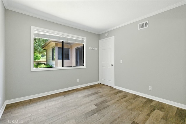 24571 Camden Ct, Laguna Niguel, CA 92677 - empty room featuring wood finished floors and crown molding