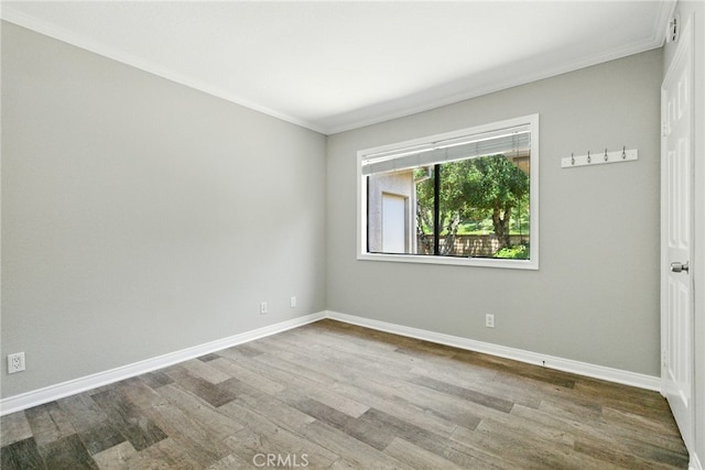 24571 Camden Ct, Laguna Niguel, CA 92677 - empty room featuring wood finished floors and ornamental molding