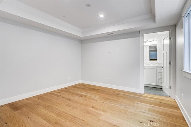 1100 Cypress Ave, Hermosa Beach, CA 90254 - spare room featuring light wood-style flooring and a raised ceiling