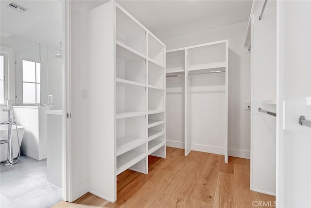 1100 Cypress Ave, Hermosa Beach, CA 90254 - spacious closet with light wood-type flooring