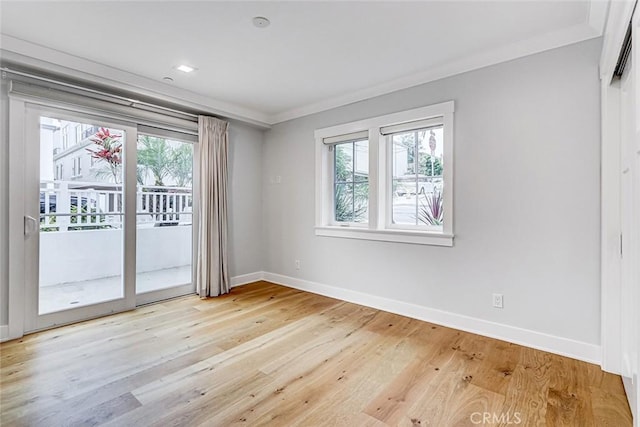 1100 Cypress Ave, Hermosa Beach, CA 90254 - empty room featuring light wood-style flooring and crown molding
