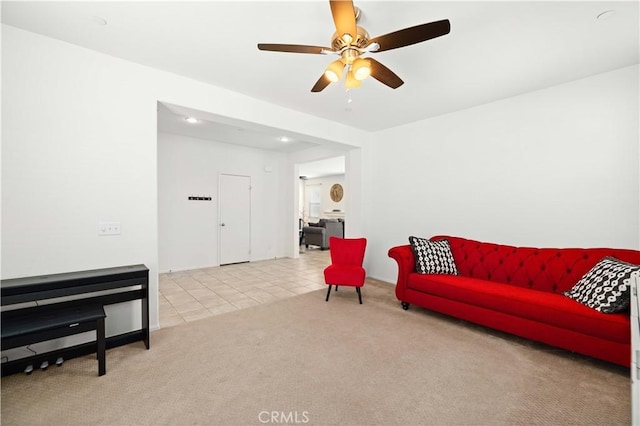 3660 Half Dome Ave, Rosamond, CA 93560 - tiled living room with carpet floors, a ceiling fan, and recessed lighting