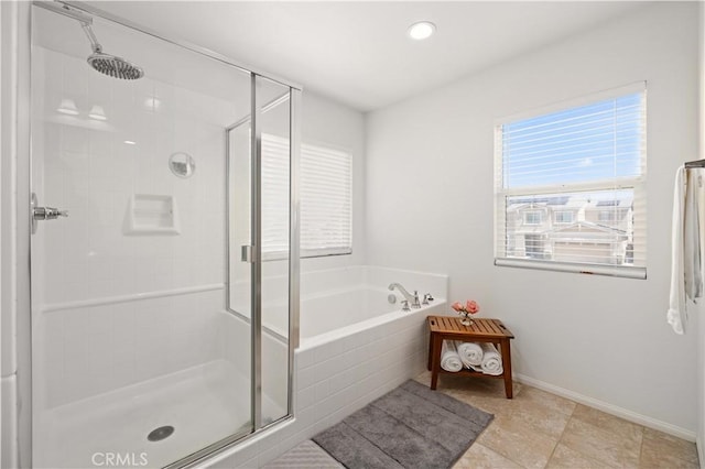 3660 Half Dome Ave, Rosamond, CA 93560 - bathroom featuring a shower stall, a bath, healthy amount of natural light, and tile patterned floors