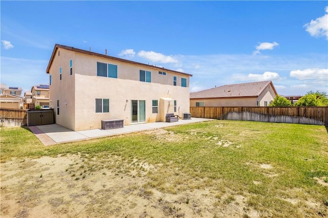 3660 Half Dome Ave, Rosamond, CA 93560 - rear view of property featuring a patio area, stucco siding, and a fenced backyard