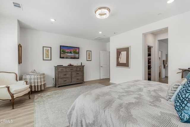 566 Purple Sage Ln, Simi Valley, CA 93065 - bedroom featuring light wood finished floors, recessed lighting, and a walk in closet