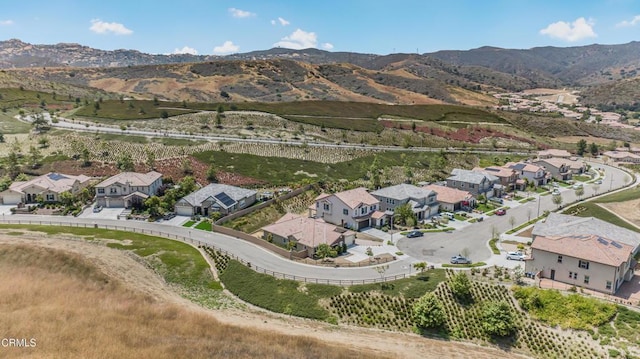 566 Purple Sage Ln, Simi Valley, CA 93065 - aerial overview of property's location featuring mountains and nearby suburban area