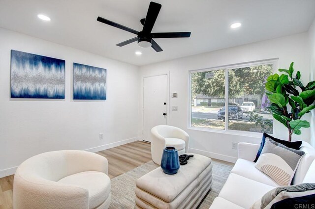 10135 Peaceful Ct, Santee, CA 92071 - living room with light wood-style floors, ceiling fan, and recessed lighting
