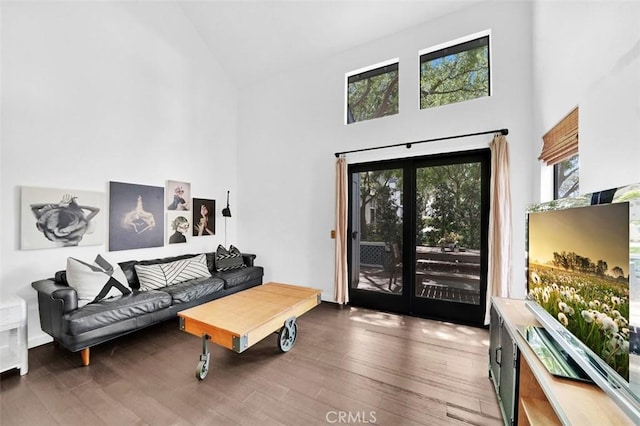 645 Springbrook N Unit 21, Irvine, CA 92614 - living room featuring high vaulted ceiling and wood finished floors