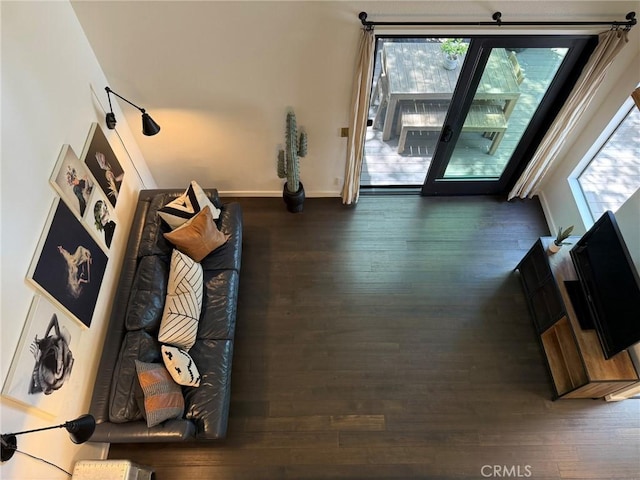 645 Springbrook N Unit 21, Irvine, CA 92614 - living room featuring wood finished floors and baseboards