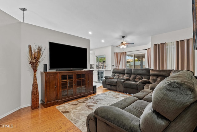 1306 Bluejay St, Fillmore, CA 93015 - living room featuring light wood-style flooring, recessed lighting, ceiling fan, and wine cooler