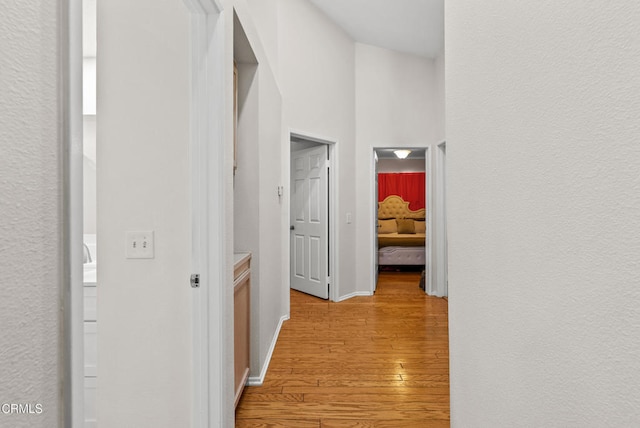 1306 Bluejay St, Fillmore, CA 93015 - hallway featuring light wood-style floors and baseboards