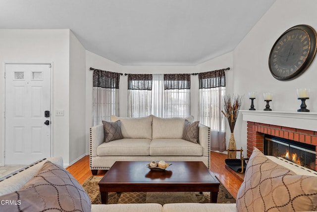 1306 Bluejay St, Fillmore, CA 93015 - living area featuring wood finished floors and a fireplace