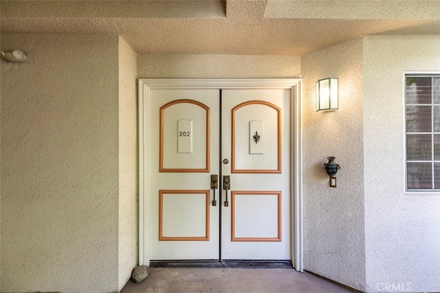 7218 Hillside Ave Unit 202, Los Angeles, CA 90046 - entrance to property featuring stucco siding and french doors