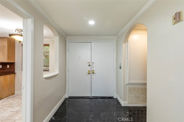 7218 Hillside Ave Unit 202, Los Angeles, CA 90046 - doorway featuring arched walkways, ornamental molding, and recessed lighting