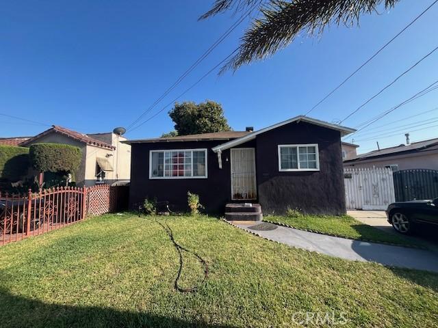 3804 Broadway Unit 3804, Huntington Park, CA 90255 - view of front of property with stucco siding and a gate