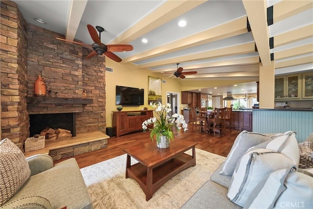 2082 Kaia Ln, Sierra Madre, CA 91024 - living room featuring ceiling fan, beam ceiling, wood finished floors, and a fireplace