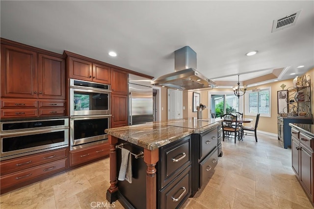 2082 Kaia Ln, Sierra Madre, CA 91024 - kitchen featuring stainless steel appliances, island range hood, stone counters, stone tile flooring, and recessed lighting