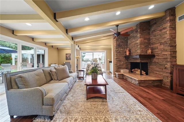 2082 Kaia Ln, Sierra Madre, CA 91024 - living area with beamed ceiling, a ceiling fan, wood finished floors, plenty of natural light, and a fireplace