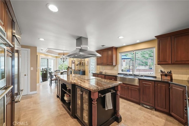 2082 Kaia Ln, Sierra Madre, CA 91024 - kitchen featuring island exhaust hood, decorative backsplash, plenty of natural light, black electric cooktop, and recessed lighting
