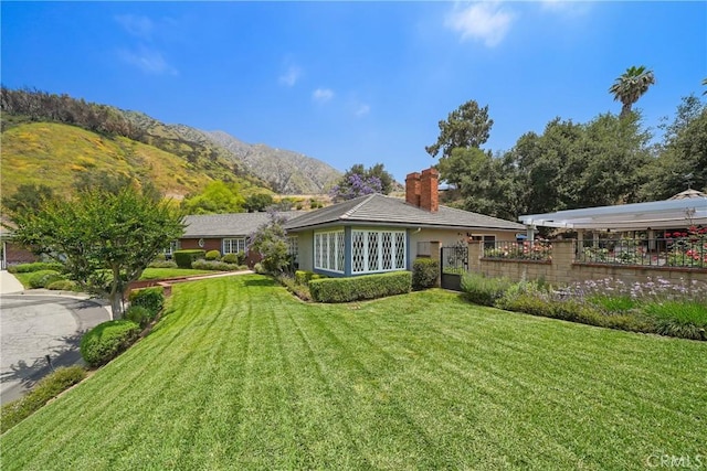 2082 Kaia Ln, Sierra Madre, CA 91024 - rear view of property featuring a chimney and a mountain view