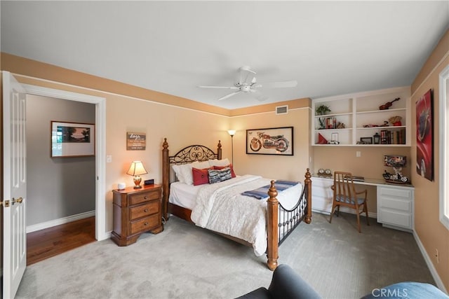 2082 Kaia Ln, Sierra Madre, CA 91024 - carpeted bedroom featuring built in desk and ceiling fan